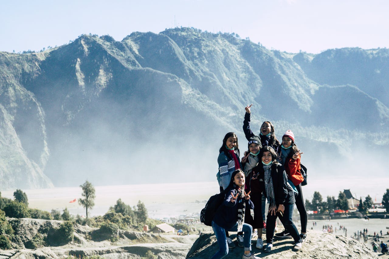 A group of women enjoying a scenic view in Bromo Tengger Semeru National Park, East Java.
